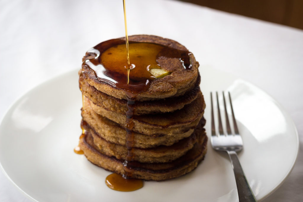 Apple Pie Brown Butter Pancakes with Maple Syrup in a White plate