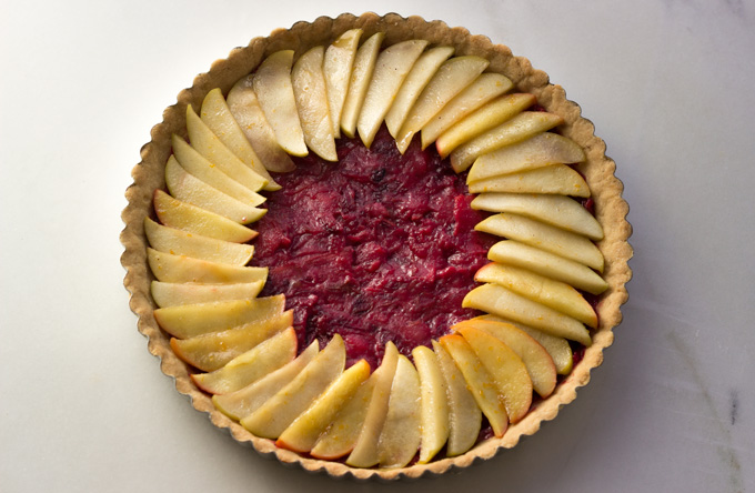 Tart Crust with filling and Topped with some Apple