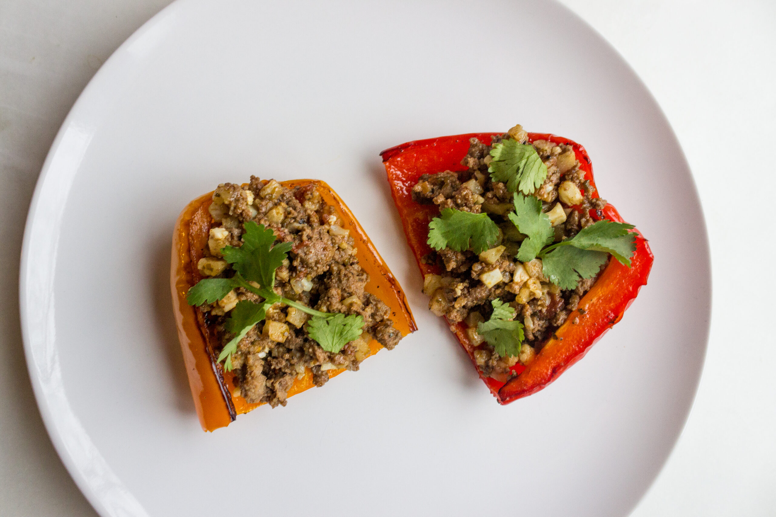 Quick Taco Stuffed Peppers {Paleo + Keto} - Well Rooted